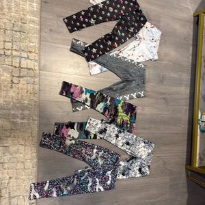 Terez size medium - 6 pairs if leggings .   Great condition.   So cute!!